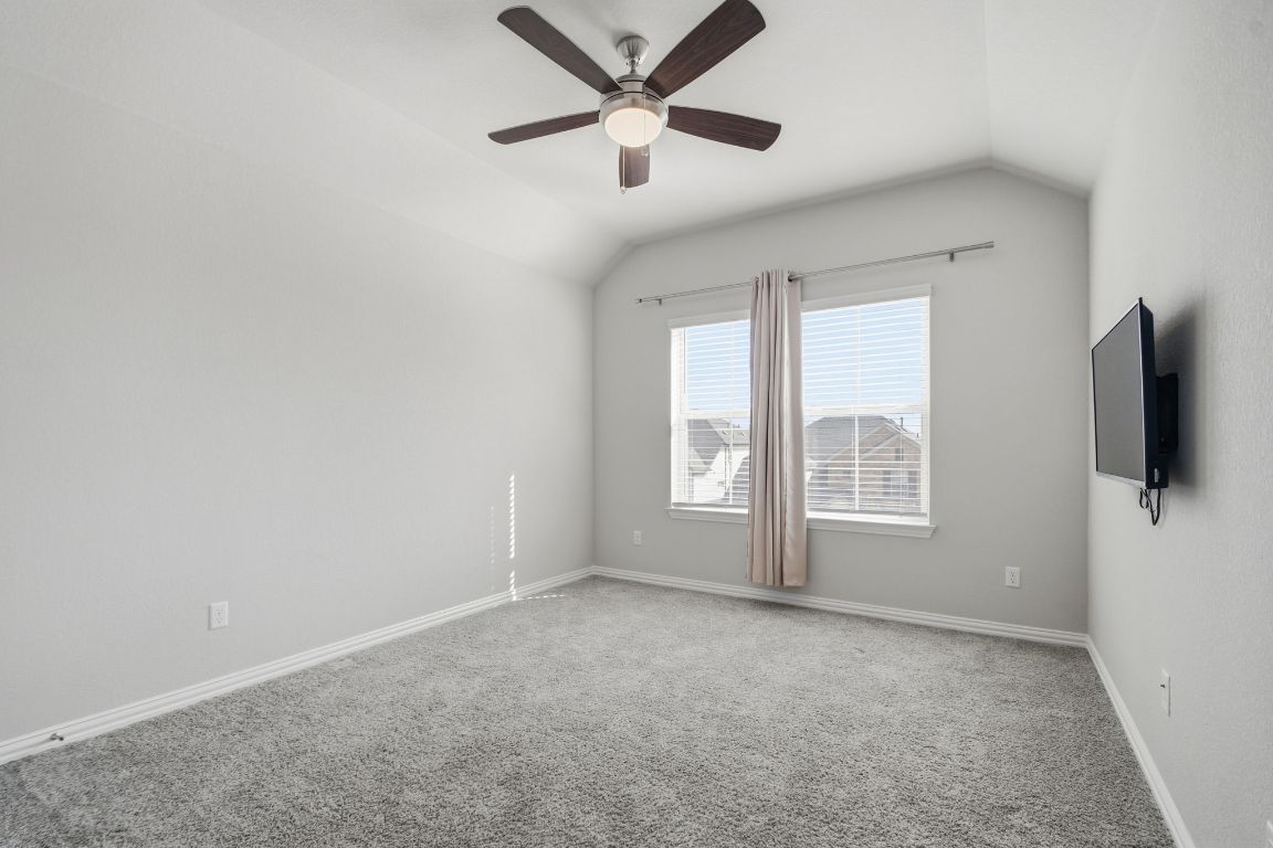 1009 Calendula Trail Georgetown, TX 78628 - Photo 27 of 31 a view of an empty room with a window
