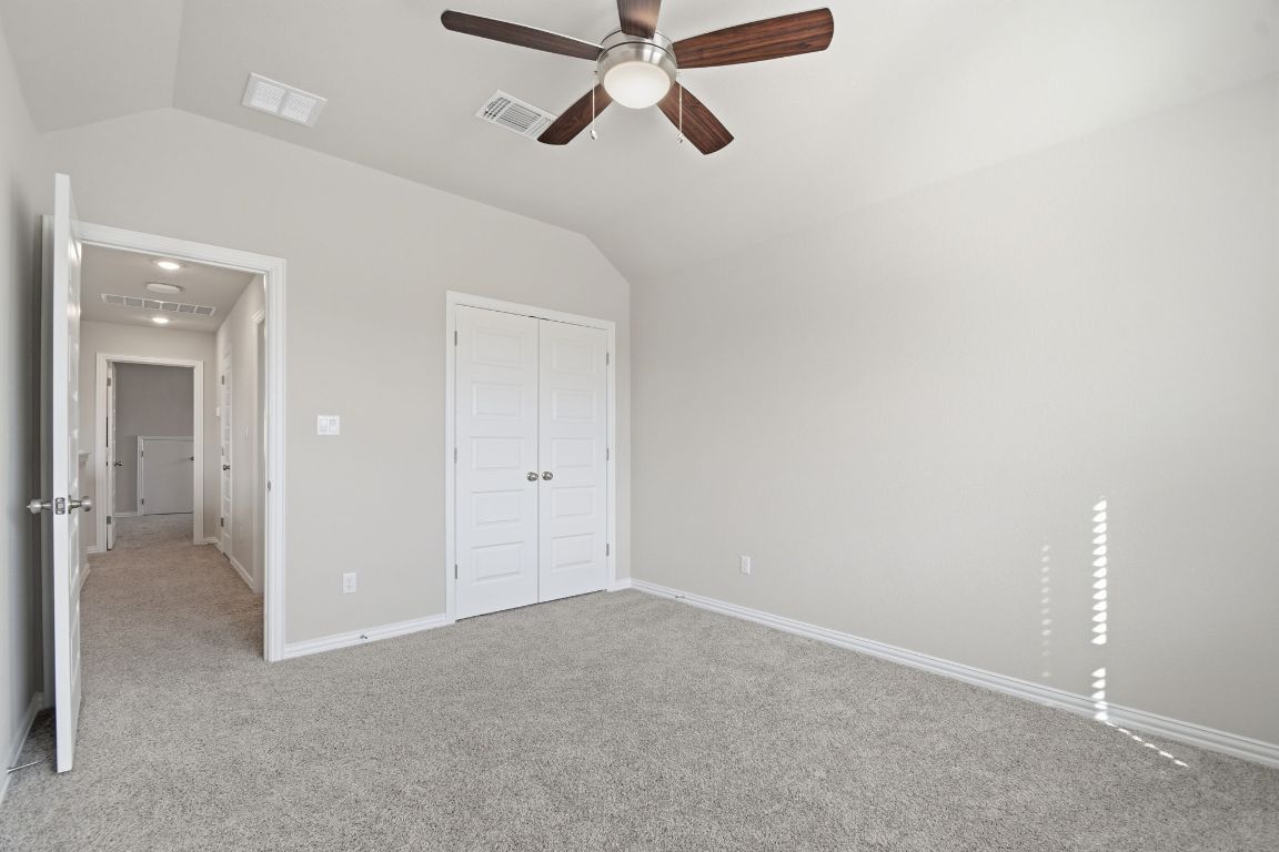 1009 Calendula Trail Georgetown, TX 78628 - Photo 28 of 31 a view of a room with a ceiling fan