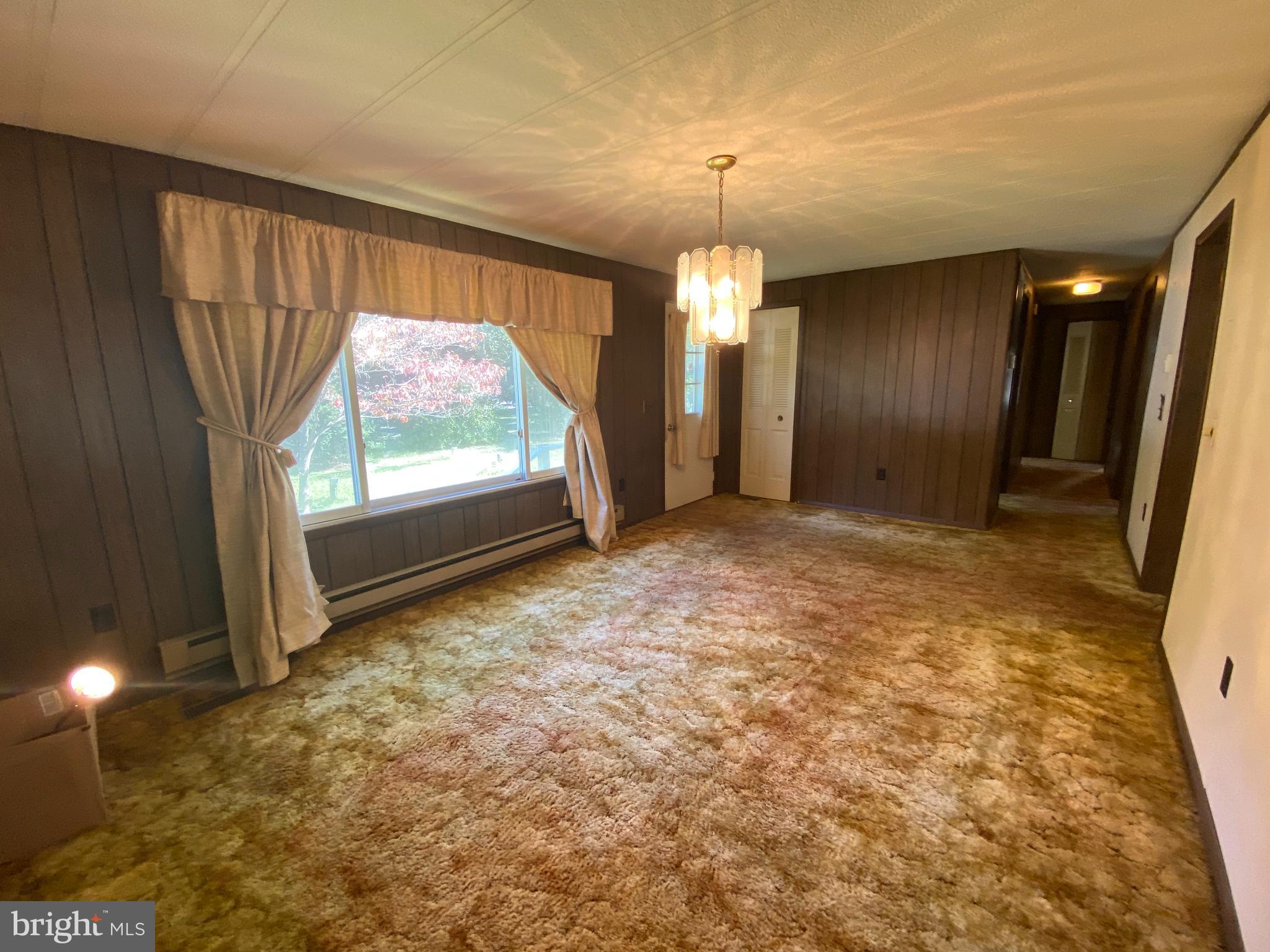 12015 Rousby Hall Road Lusby, MD 20657 - Photo 13 of 22 Family room
