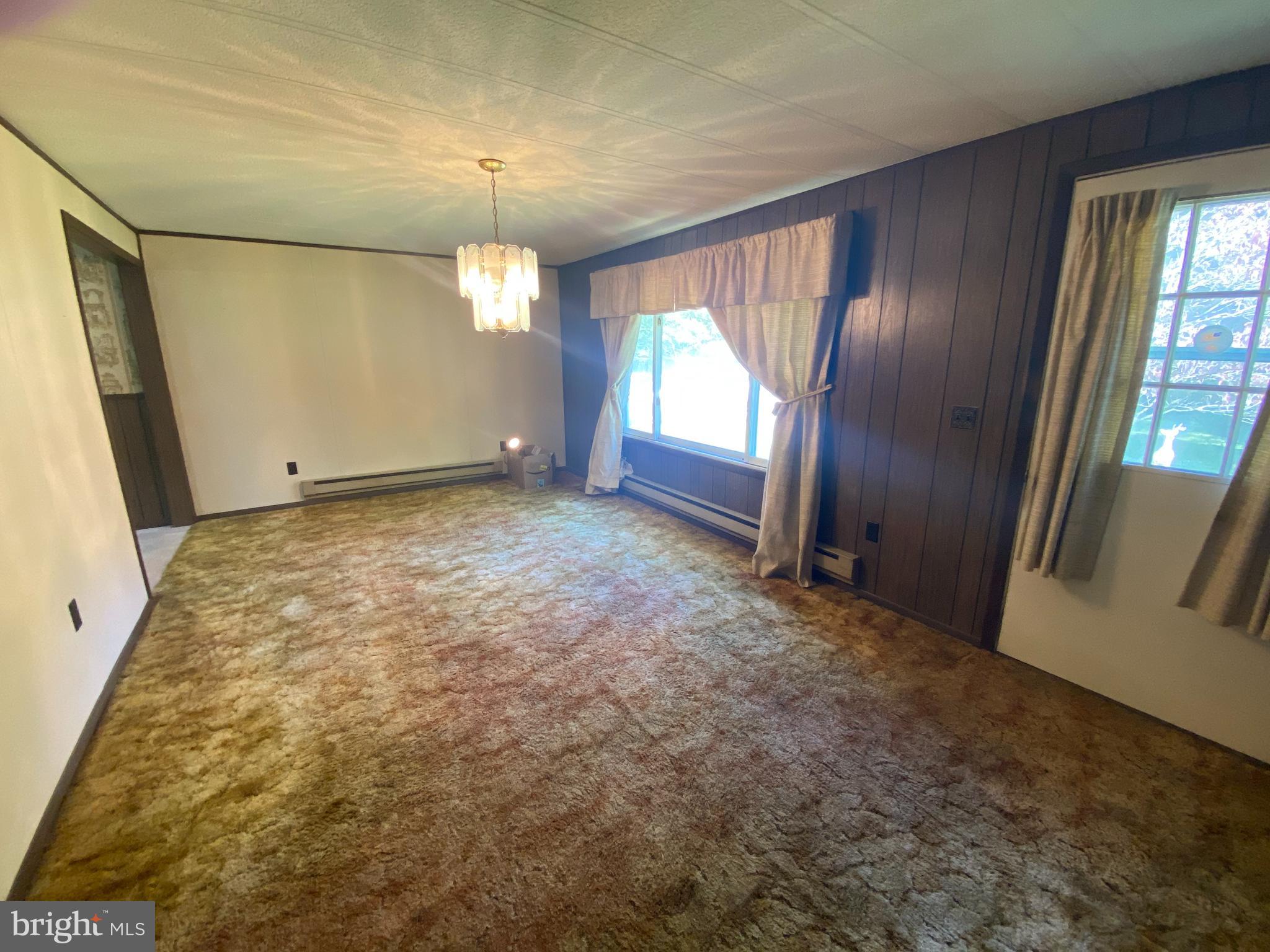 12015 Rousby Hall Road Lusby, MD 20657 - Photo 14 of 22 Another view of family room