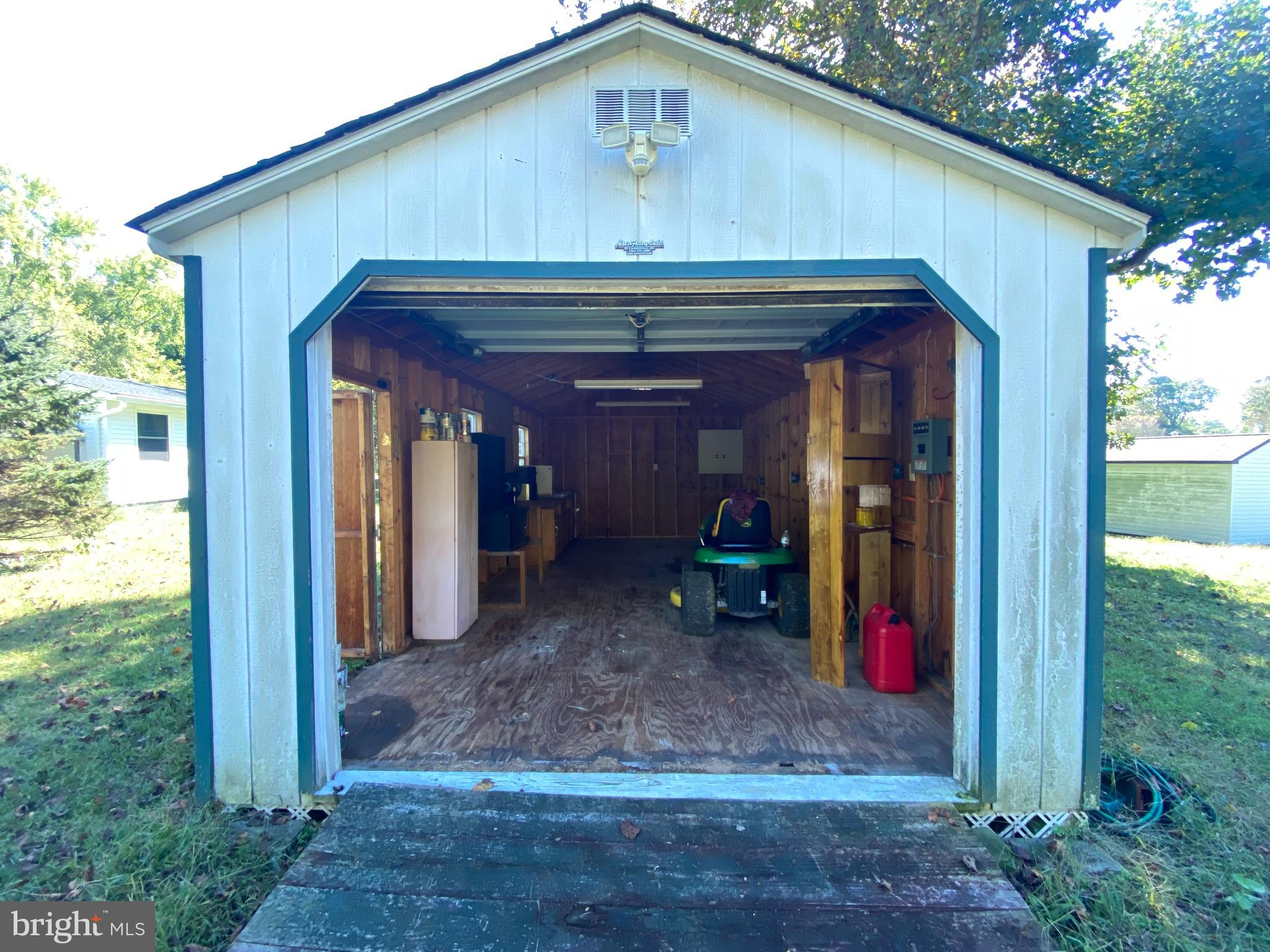 12015 Rousby Hall Road Lusby, MD 20657 - Photo 21 of 22 Garage