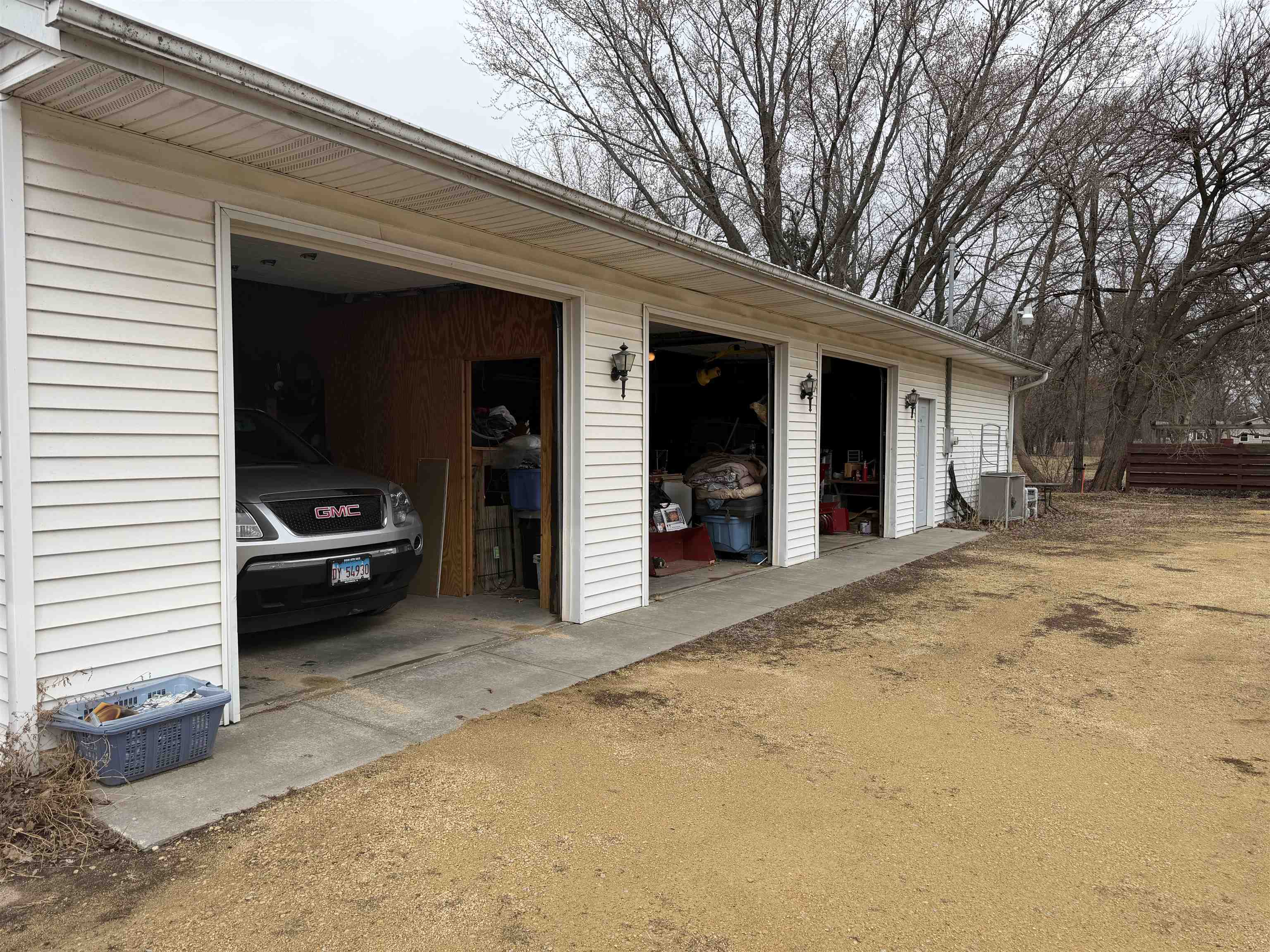 509 North Walnut Street Byron, IL 61010 - Photo 5 of 15 a car parked in front of house