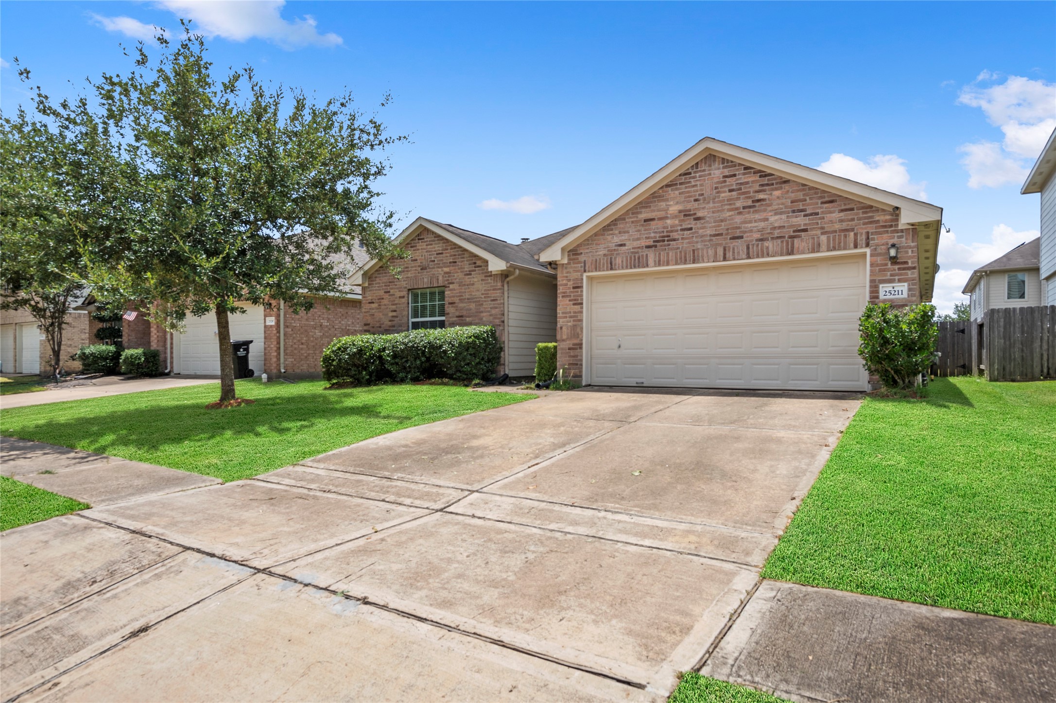 25211 Bluma Ranch Drive Katy, TX 77494 - Photo 2 of 22 front view of a house with a yard