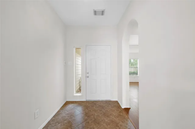 a view of hallway with closet