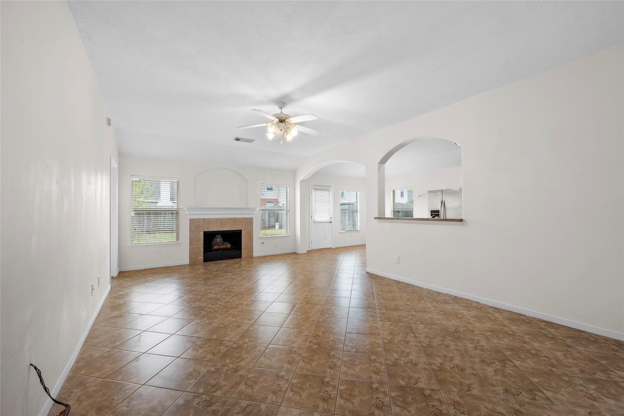 25211 Bluma Ranch Drive Katy, TX 77494 - Photo 5 of 22 a view of a livingroom with a fireplace