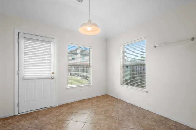 an empty room with windows