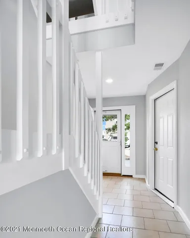 a view of a balcony and ocean view