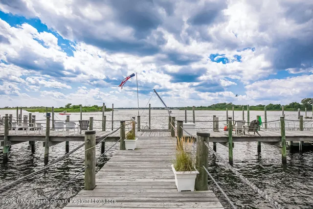 a front view of a building with lake view