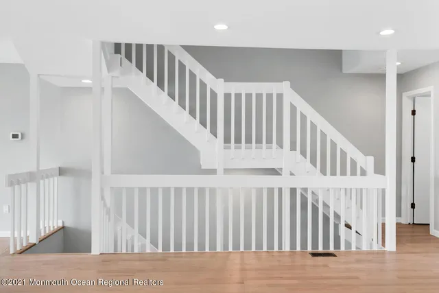 a view of entryway with wooden floor