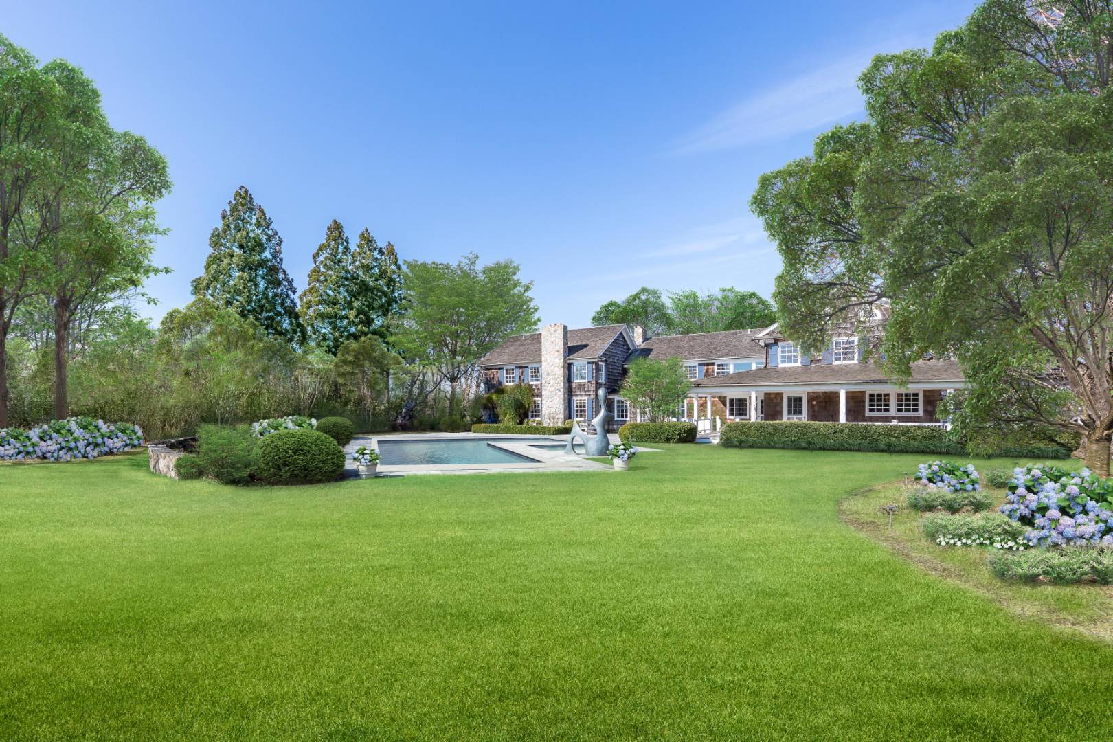 675 Flying Point Road Water Mill, NY 11976 - Photo 2 of 47 a view of a house with a big yard potted plants and large tree