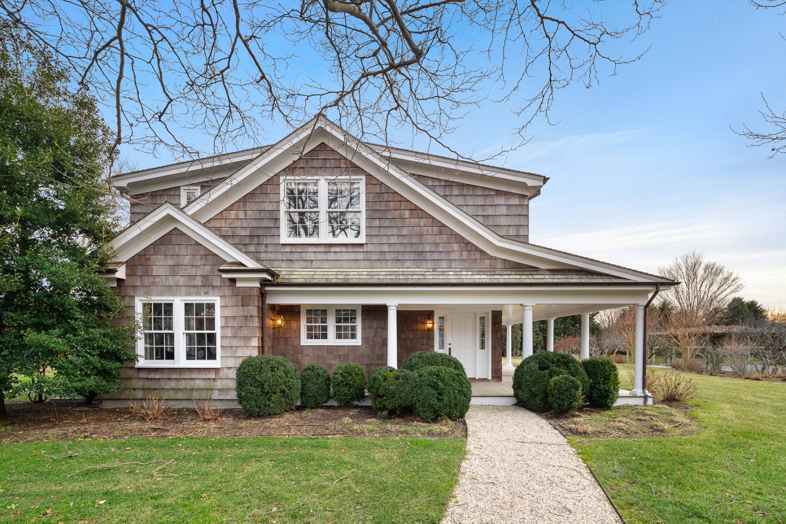 675 Flying Point Road Water Mill, NY 11976 - Photo 11 of 47 front view of a house with a yard