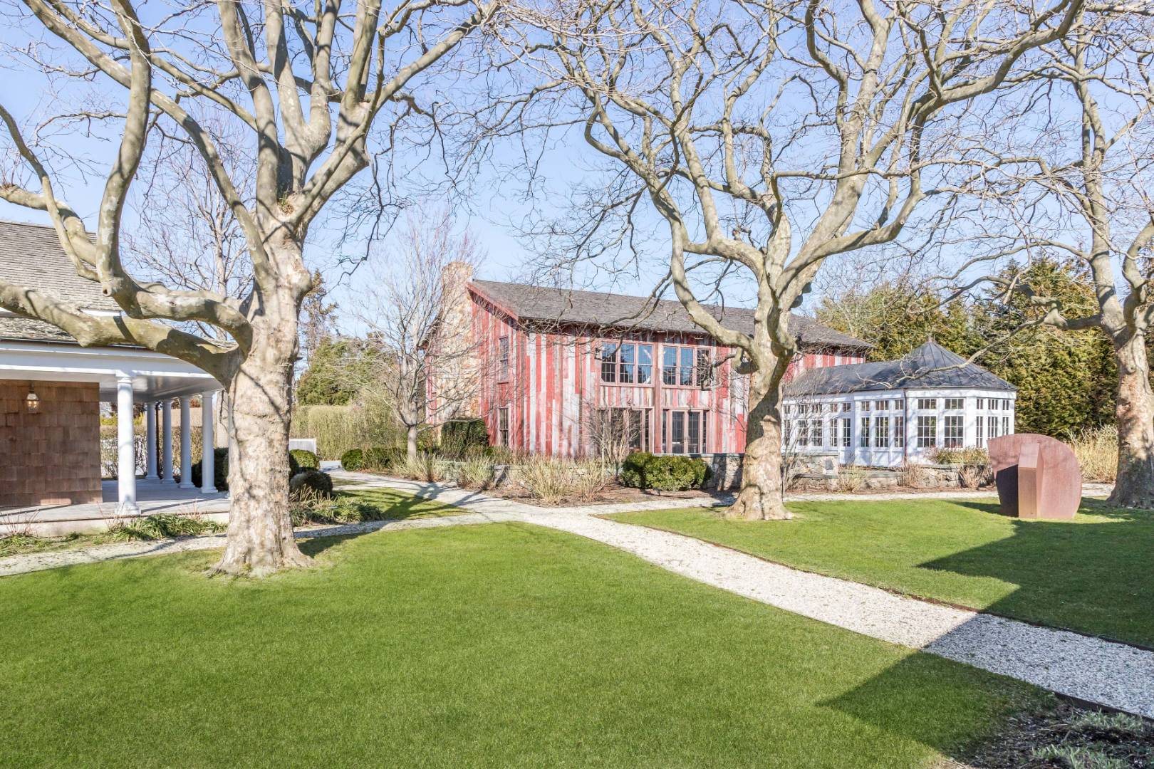 675 Flying Point Road Water Mill, NY 11976 - Photo 3 of 47 a view of a building with a yard