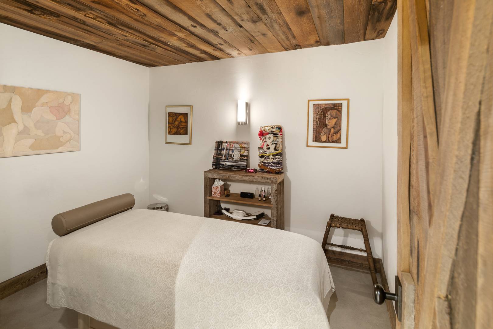 675 Flying Point Road Water Mill, NY 11976 - Photo 28 of 47 a bedroom with a bed and a chair