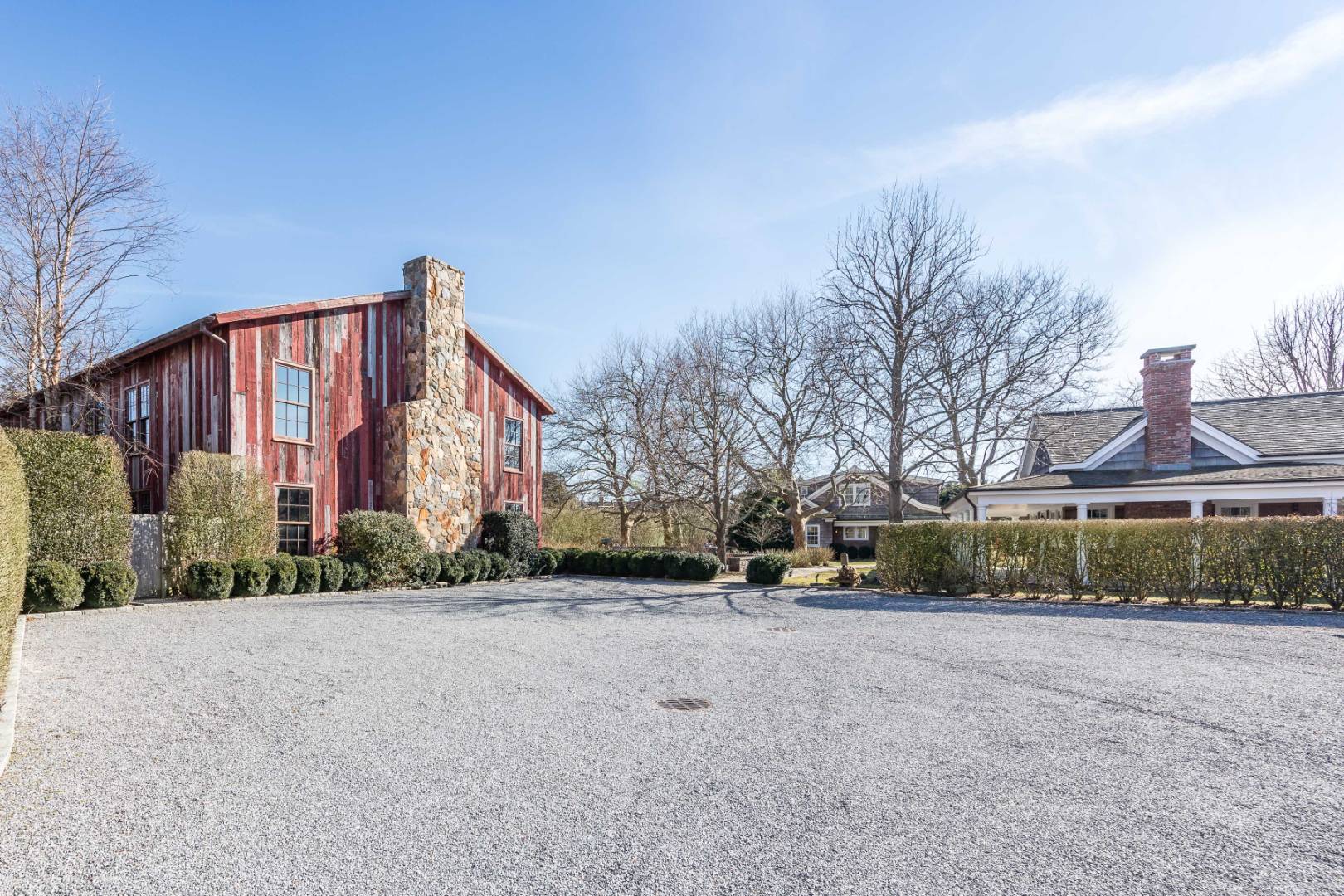 675 Flying Point Road Water Mill, NY 11976 - Photo 4 of 47 a view of a building with a yard