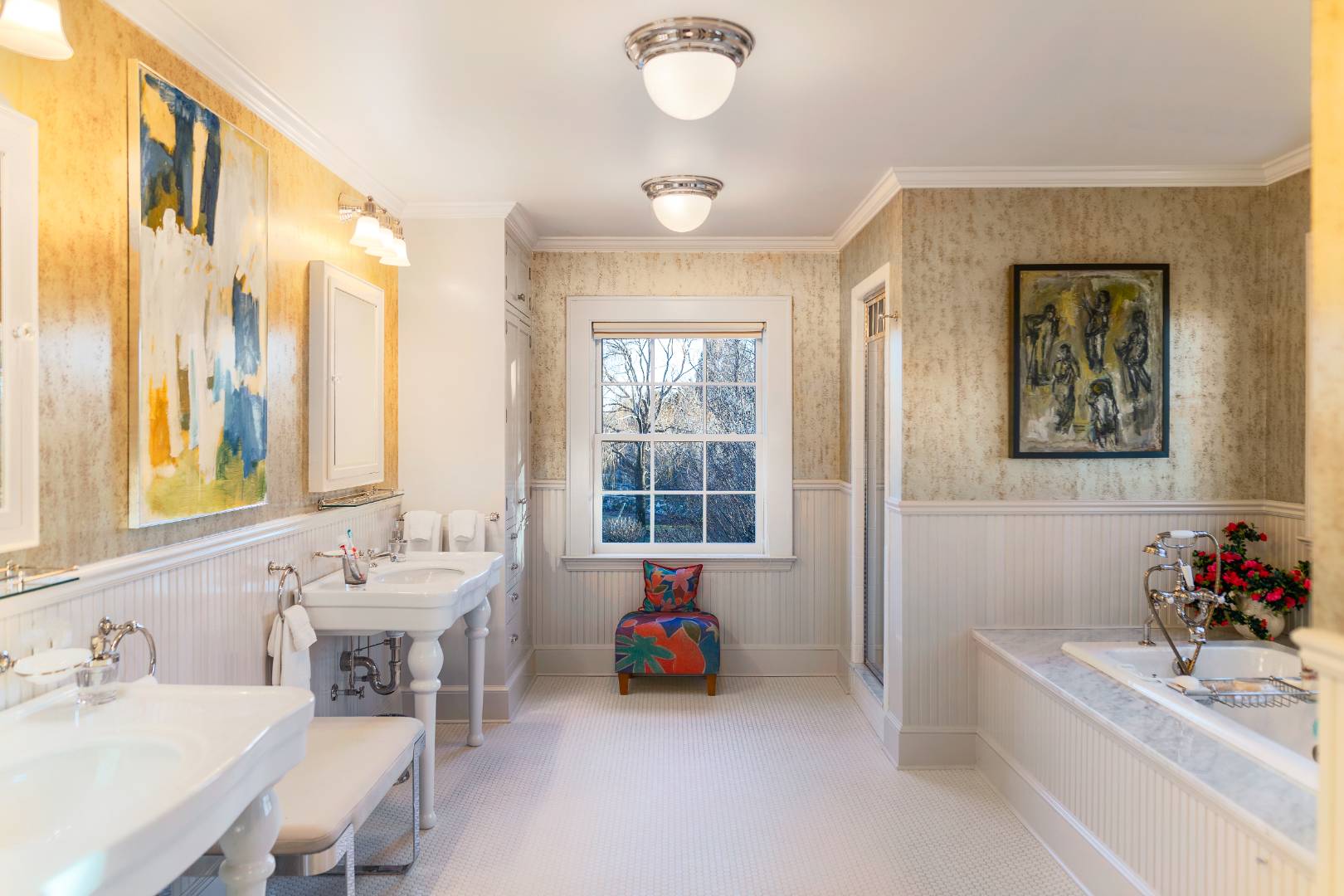 675 Flying Point Road Water Mill, NY 11976 - Photo 38 of 47 a bathroom with a tub sink and a mirror