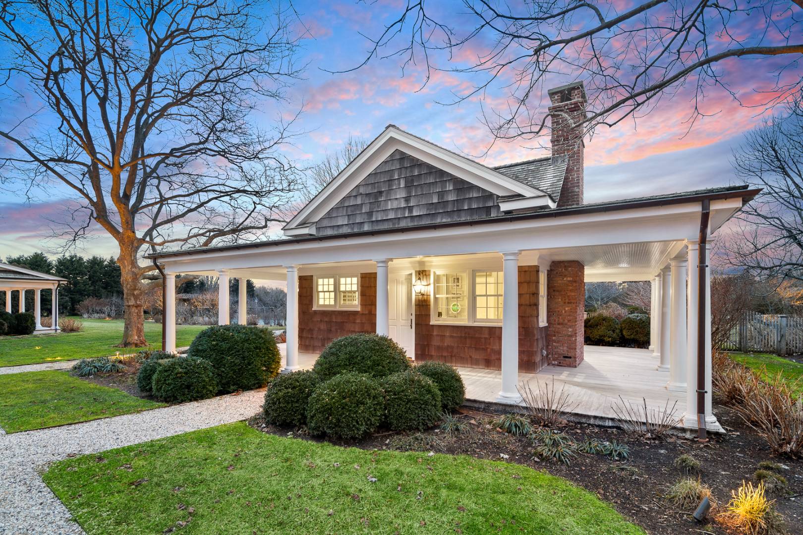 675 Flying Point Road Water Mill, NY 11976 - Photo 10 of 47 a view of a house with a garden