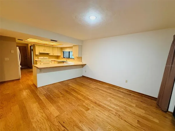 a view of a kitchen with a sink and dishwasher