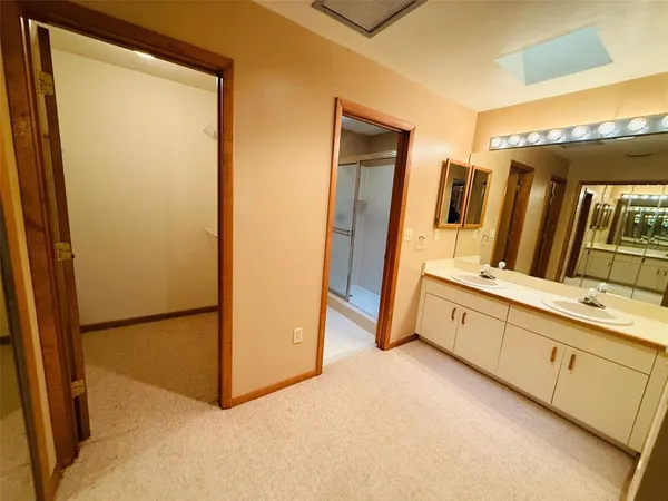 a view of hallway with a large window
