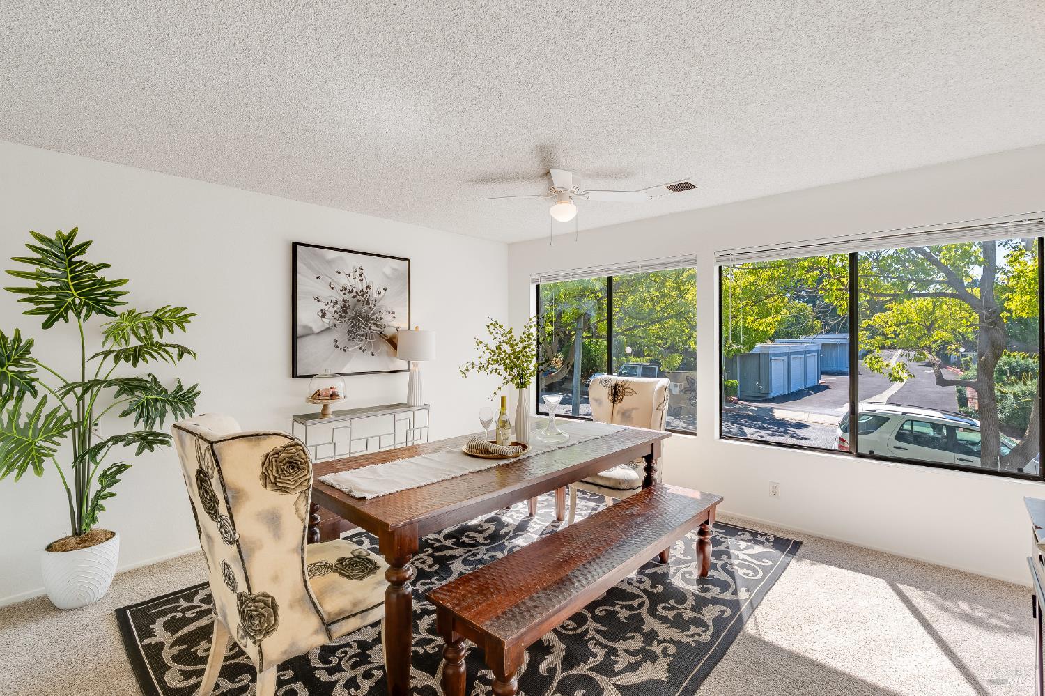 2000 Clearview Circle Benicia, CA 94510 - Photo 5 of 33 a view of a dining room with furniture large windows and wooden floor