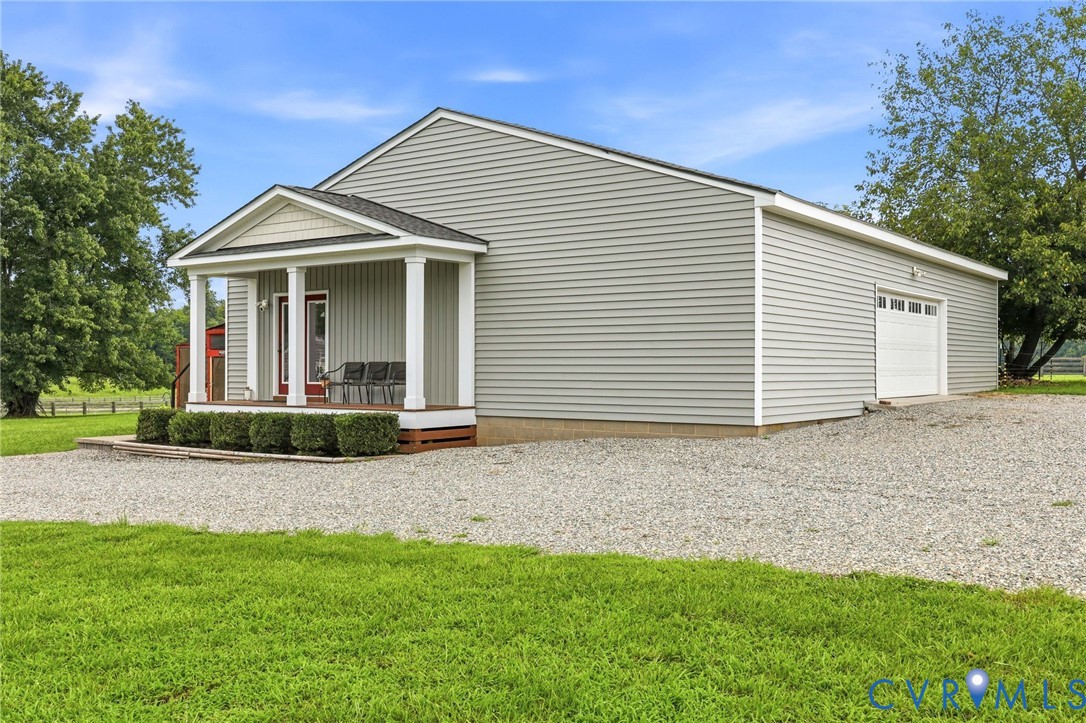 1108 Schroeder Road Powhatan, VA 23139 - Photo 7 of 33 Light gray siding exterior with a covered porch, w