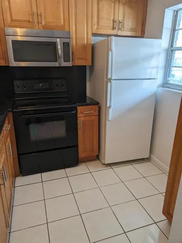 a utility room with washer and dryer