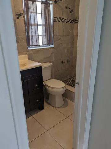 a bathroom with a toilet and a sink