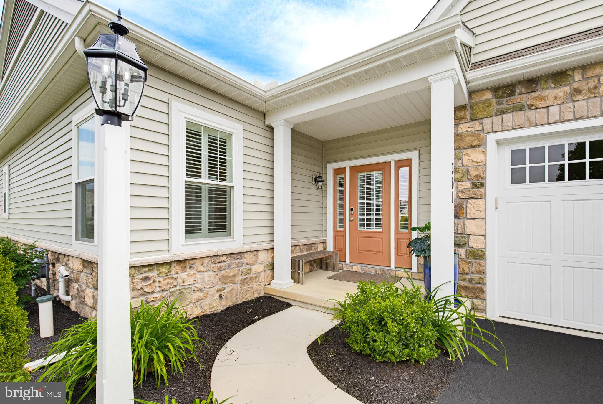 361 Meadow Rose Drive Lititz, PA 17543 - Photo 2 of 39 a front view of a house with garden