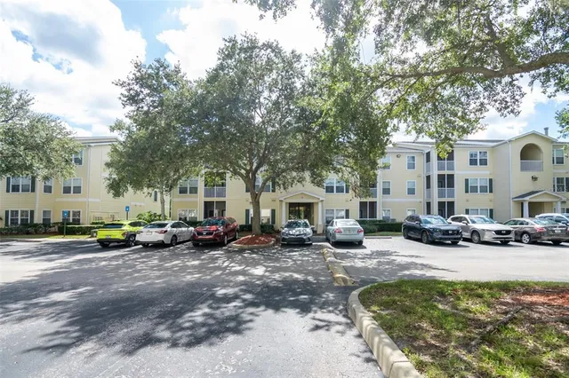 a view of a house with a snow in a yard