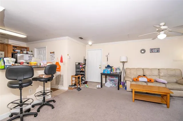 a view of a workspace with furniture