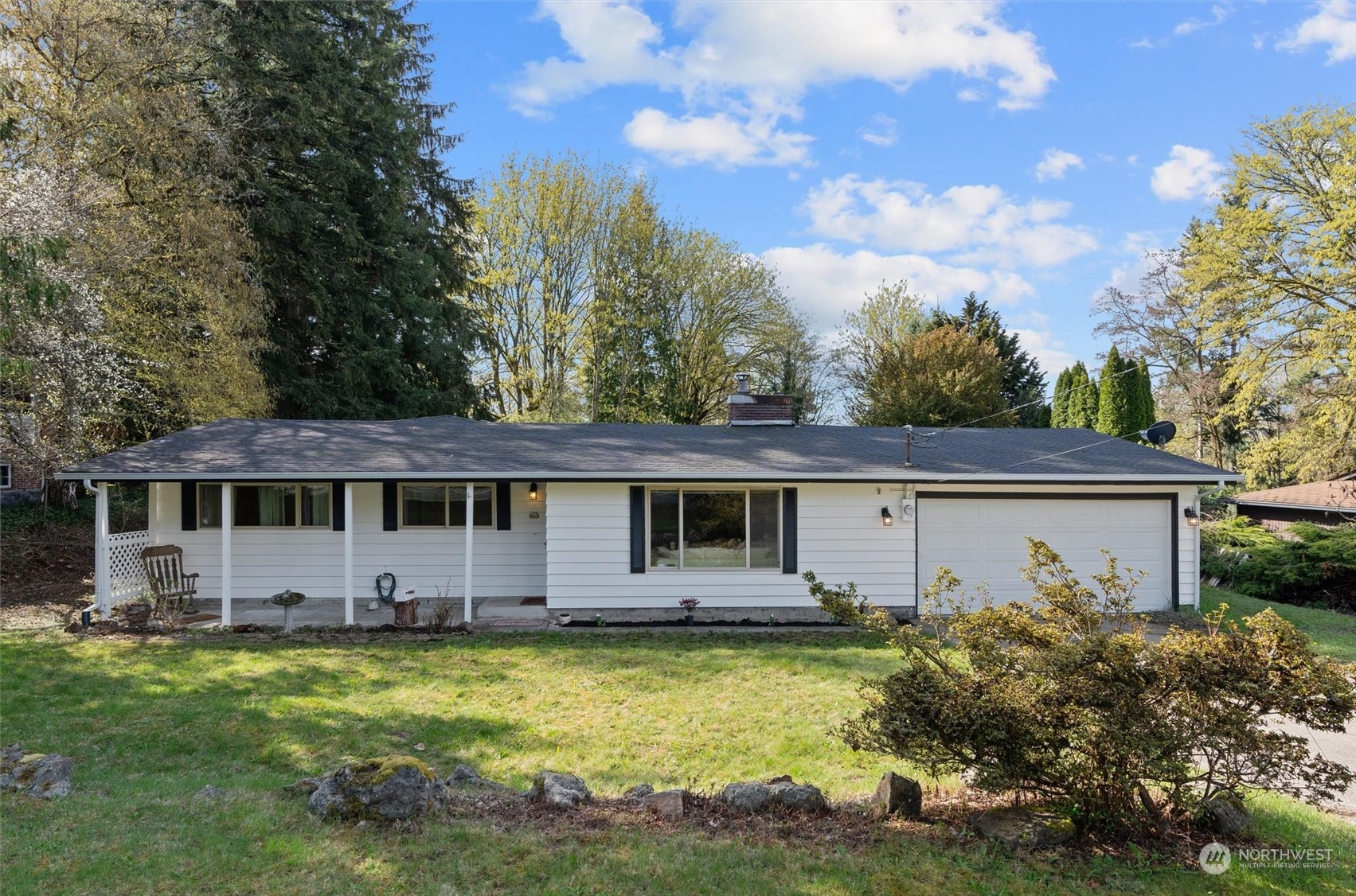 17545 Southeast 134th Street Renton, WA 98059 - Photo 1 of 40 a view of a house with pool and chairs