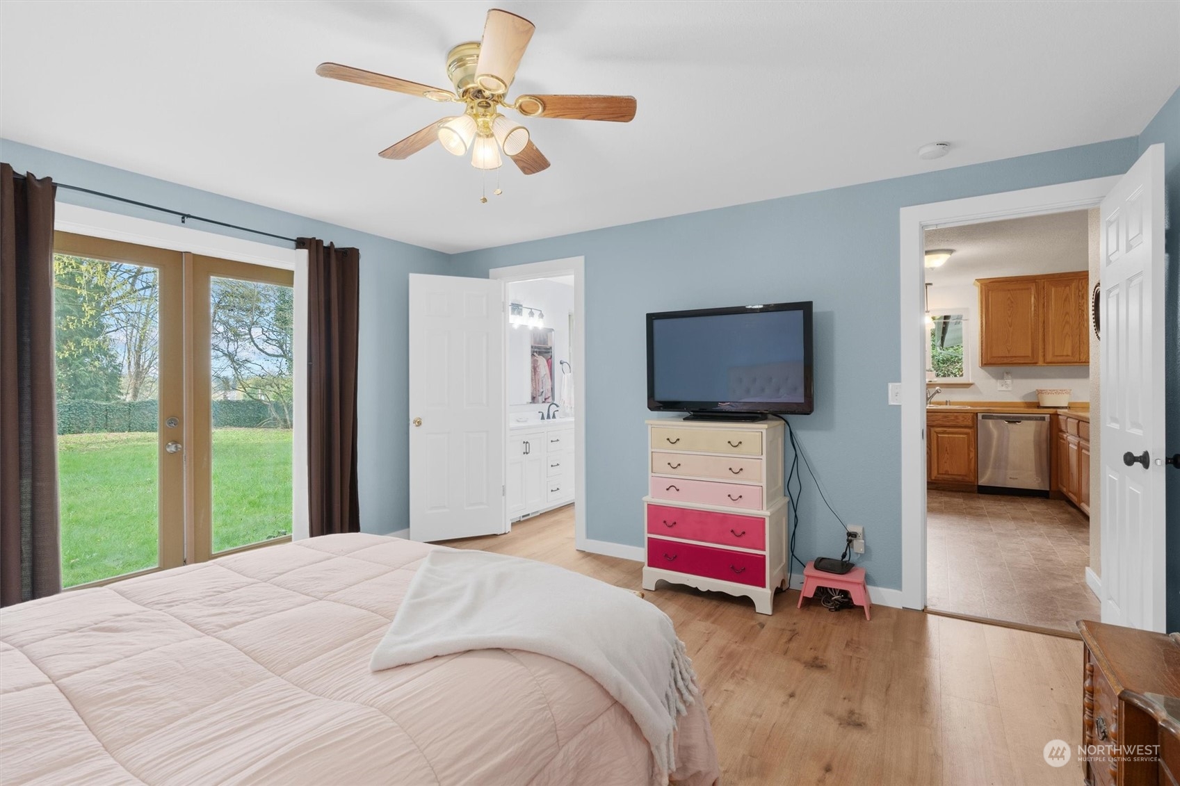 17545 Southeast 134th Street Renton, WA 98059 - Photo 14 of 40 a bedroom with a bed and a flat screen tv