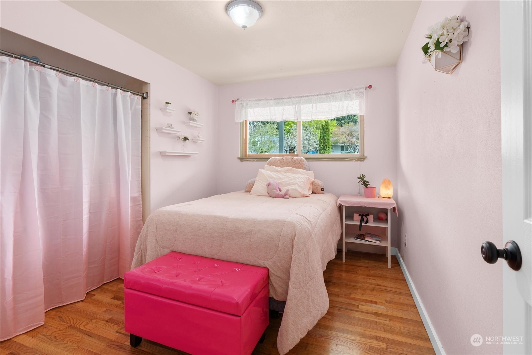 17545 Southeast 134th Street Renton, WA 98059 - Photo 20 of 40 a bedroom with a bed and a window