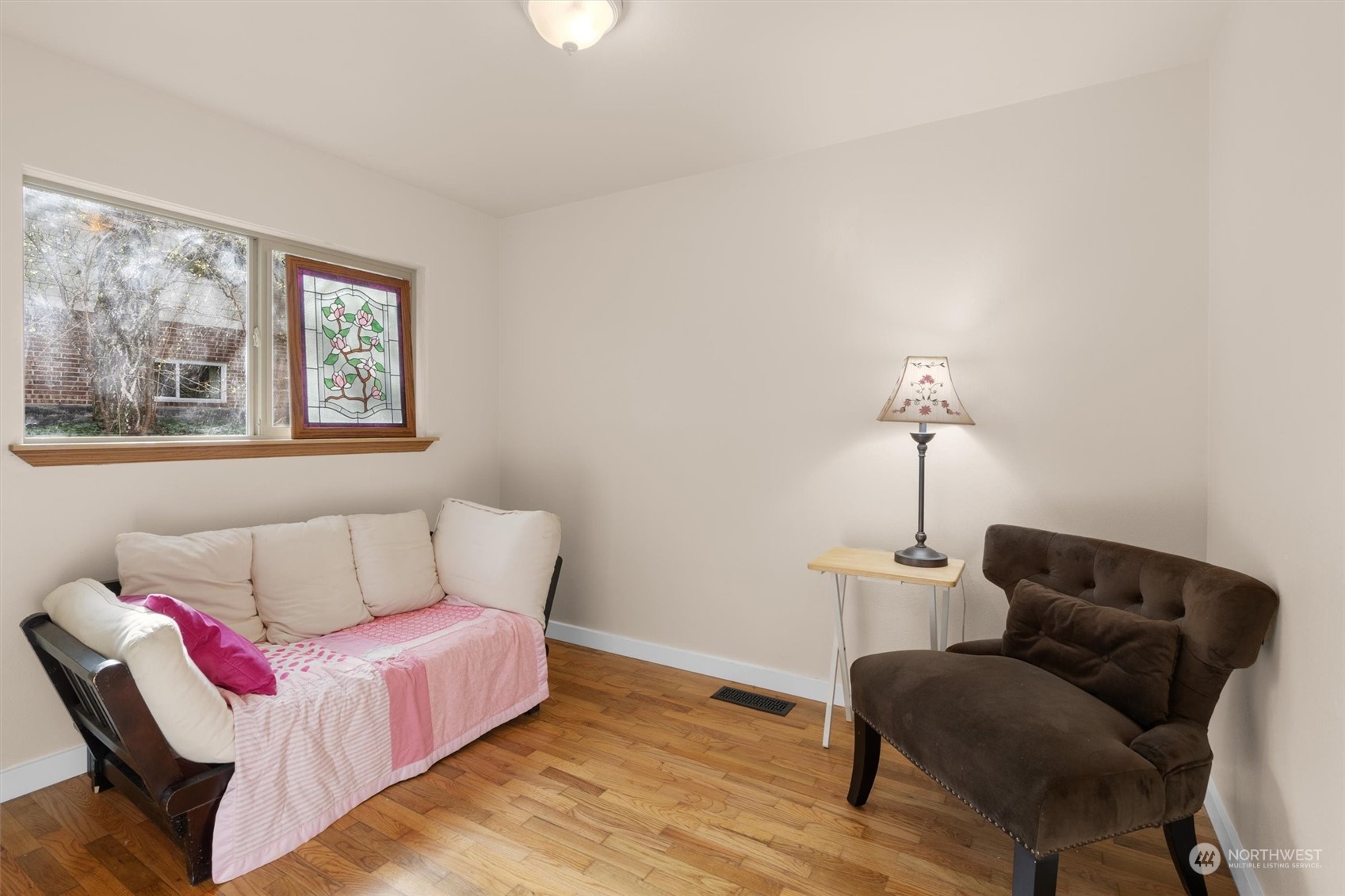 17545 Southeast 134th Street Renton, WA 98059 - Photo 21 of 40 a living room with furniture and a wooden floor