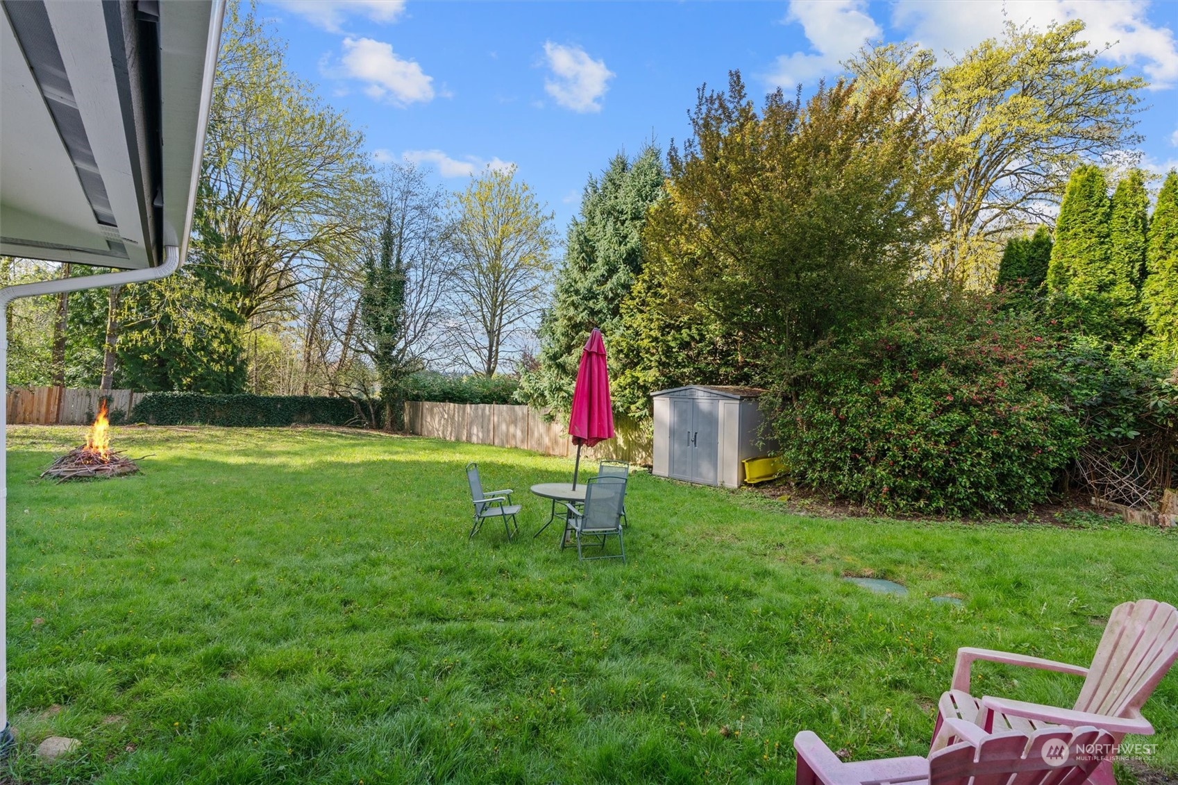 17545 Southeast 134th Street Renton, WA 98059 - Photo 24 of 40 a garden with trees in the background