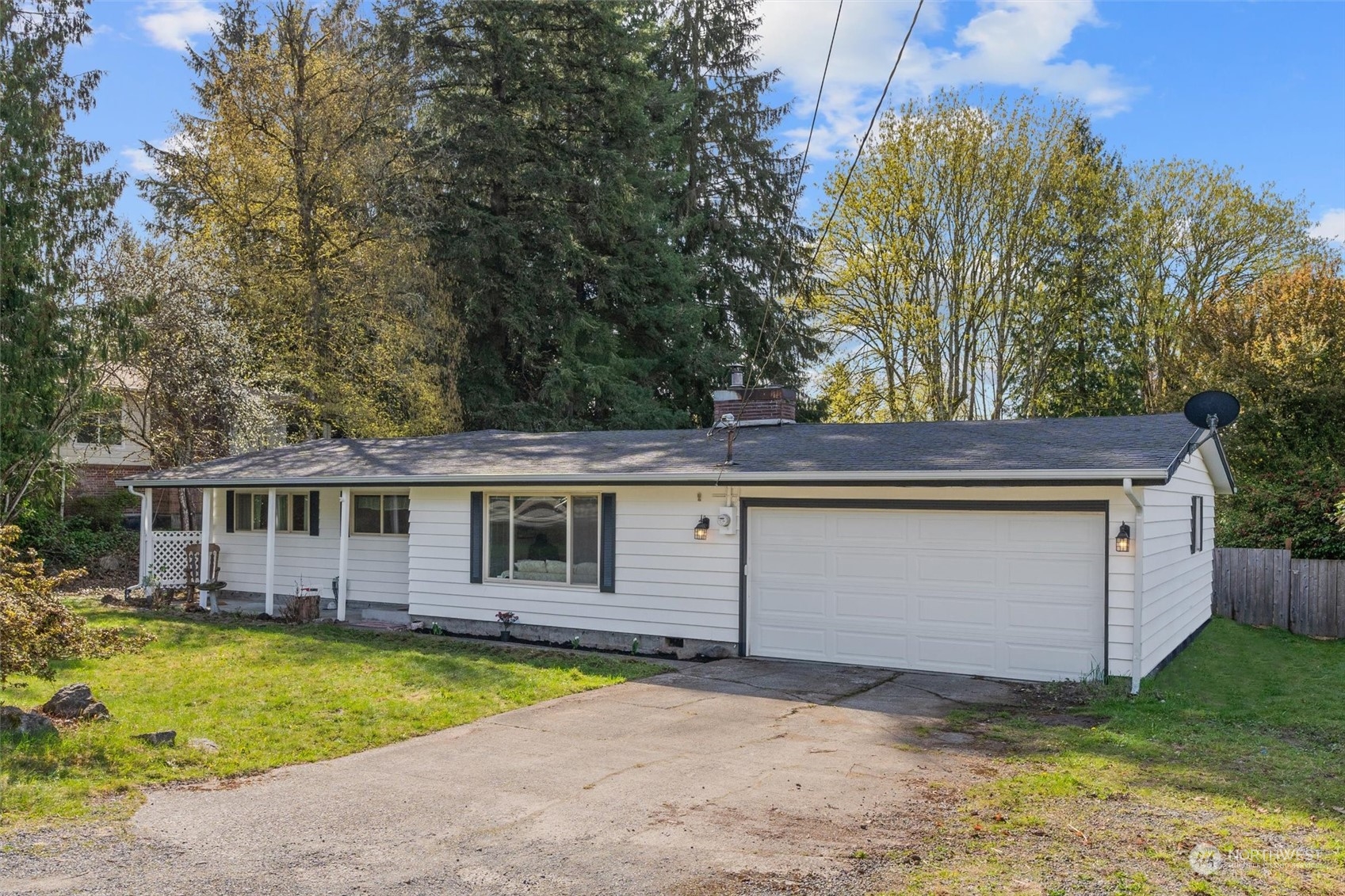 17545 Southeast 134th Street Renton, WA 98059 - Photo 30 of 40 a view of a house with a backyard and a tree