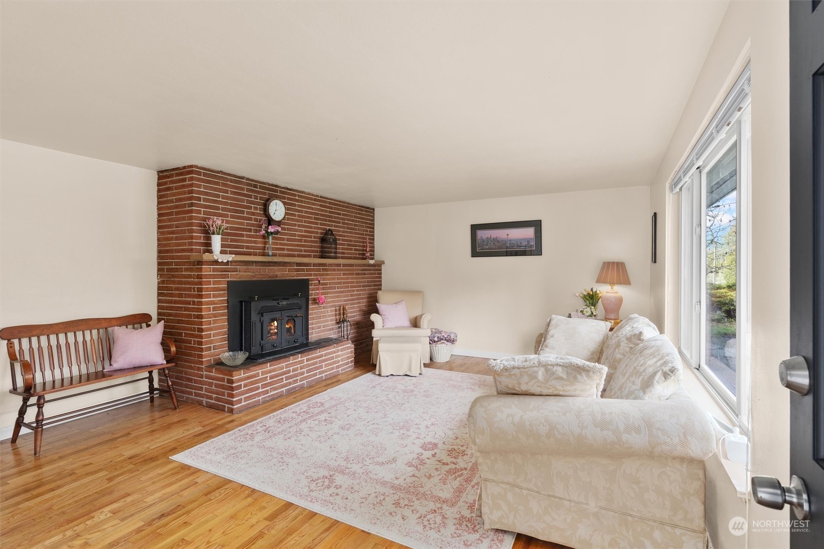 17545 Southeast 134th Street Renton, WA 98059 - Photo 3 of 40 a bedroom with a bed and a fireplace