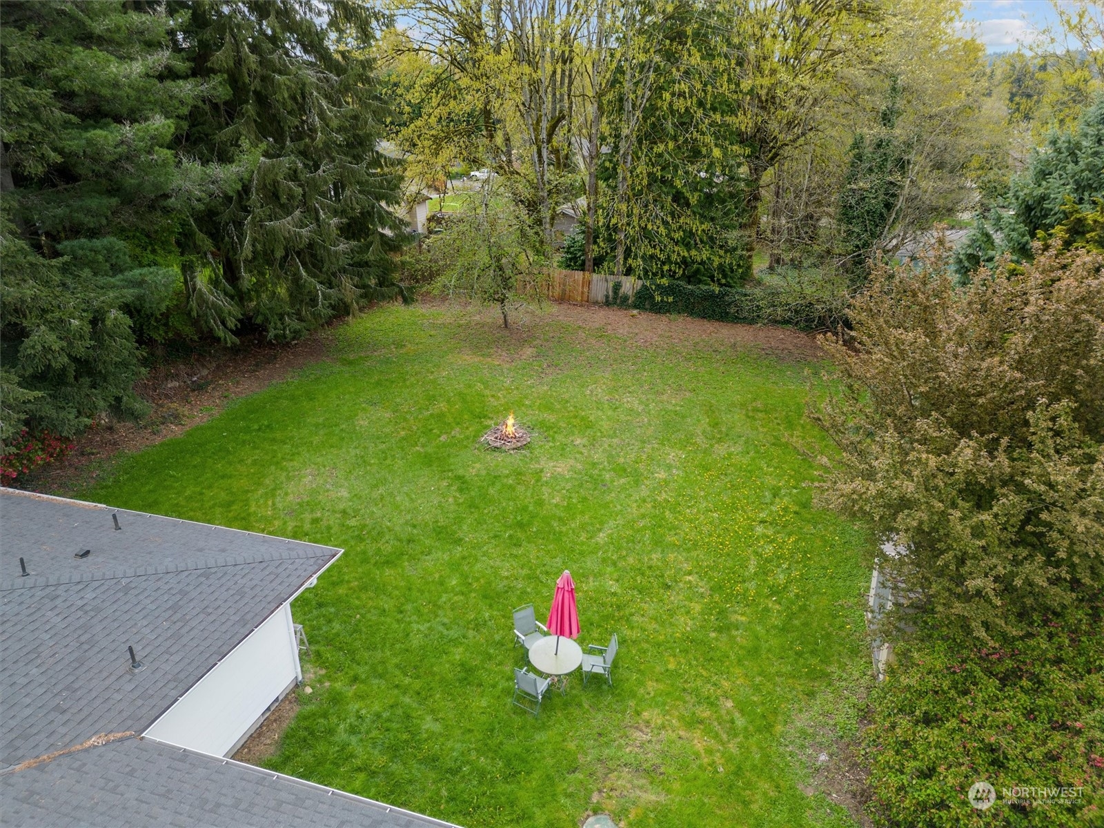 17545 Southeast 134th Street Renton, WA 98059 - Photo 35 of 40 a backyard of a house with lots of green space