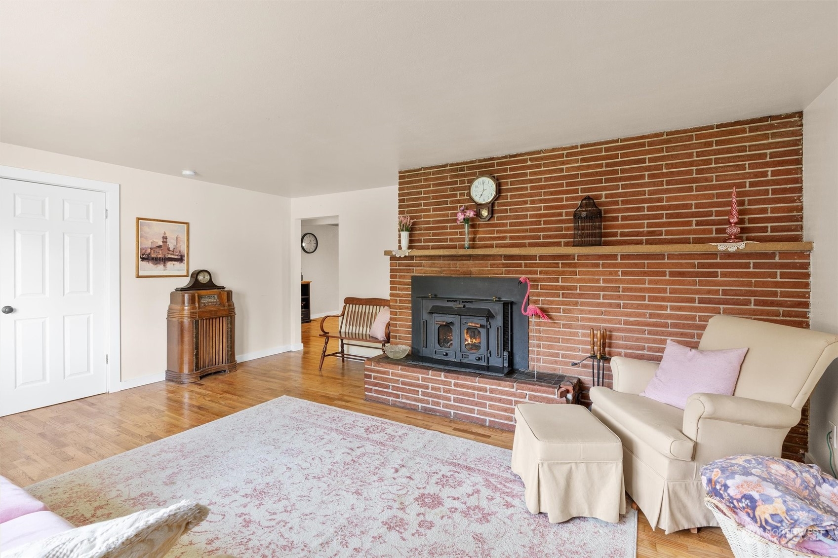 17545 Southeast 134th Street Renton, WA 98059 - Photo 4 of 40 a living room with furniture and a fireplace