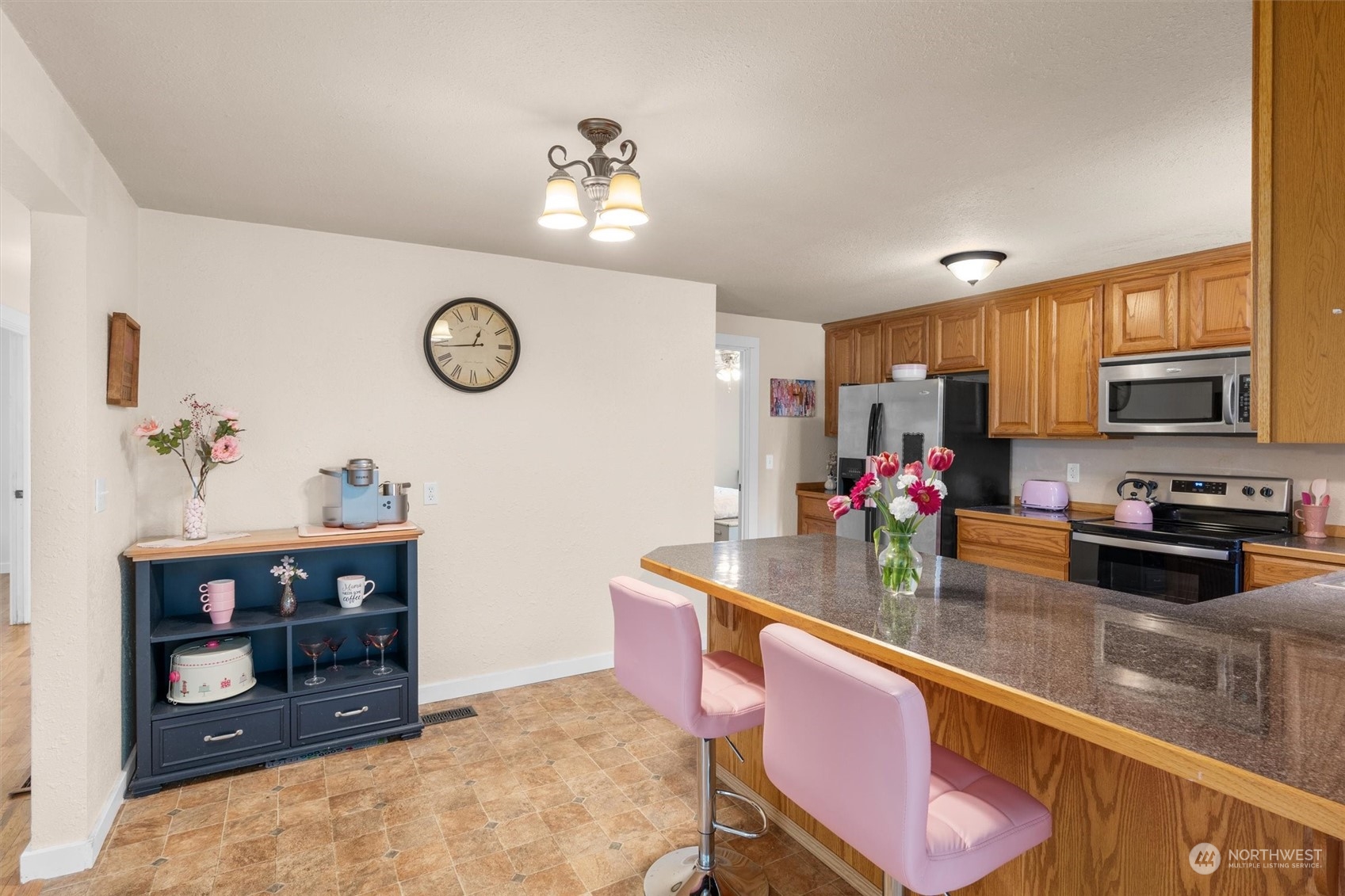 17545 Southeast 134th Street Renton, WA 98059 - Photo 9 of 40 a view of kitchen with sink and microwave