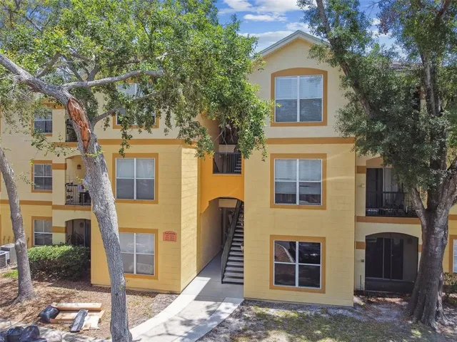 a front view of a house with stairs