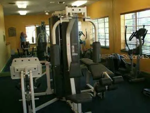 a view of a bathroom with dual sinks