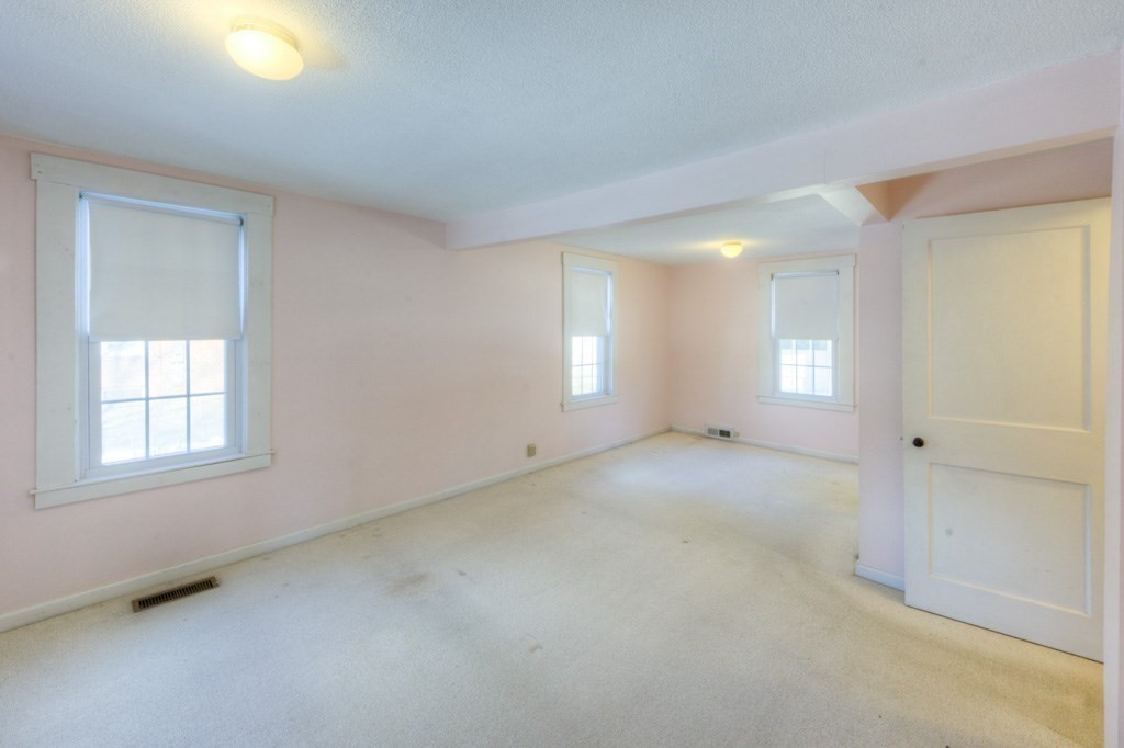 21 Marchioness Road Springfield, MA 01129 - Photo 18 of 38 an empty room with windows and closet