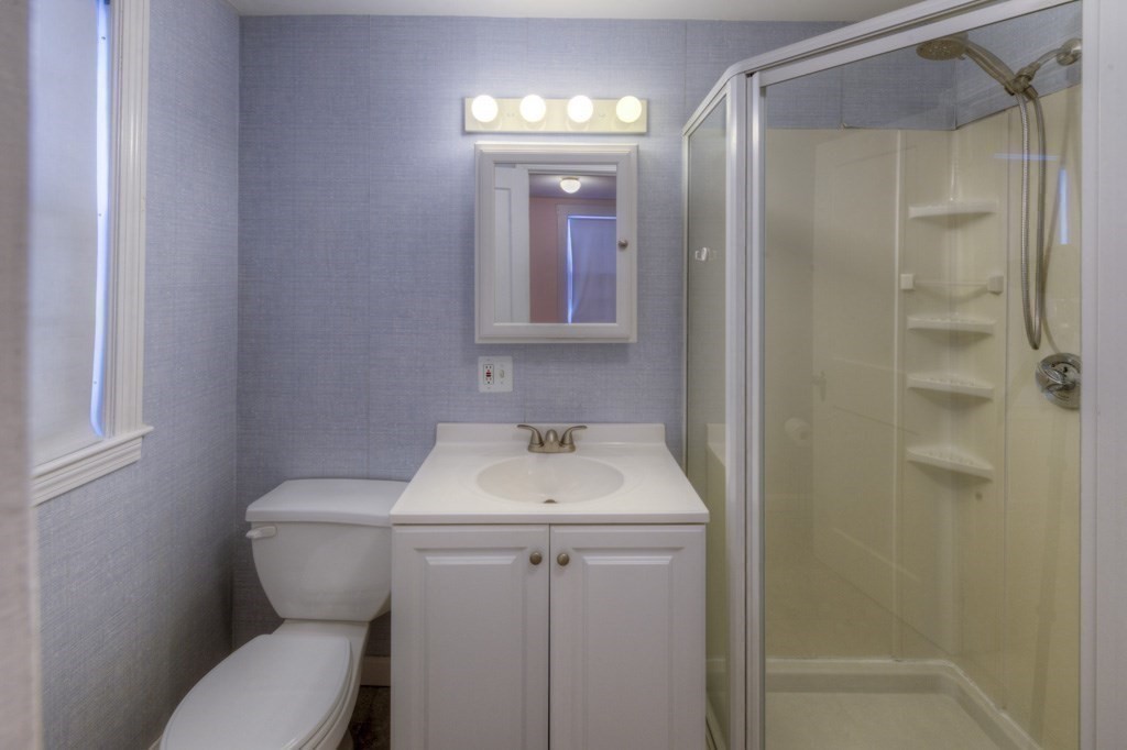 21 Marchioness Road Springfield, MA 01129 - Photo 19 of 38 a bathroom with a toilet sink and shower