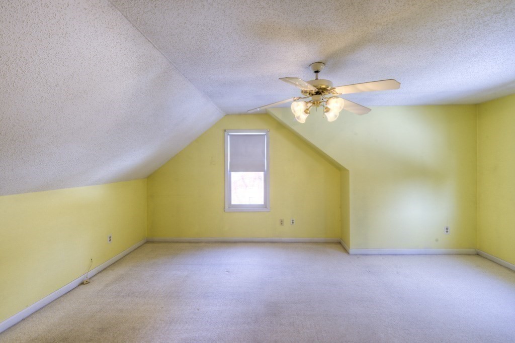 21 Marchioness Road Springfield, MA 01129 - Photo 20 of 38 an empty room with a window and a ceiling fan