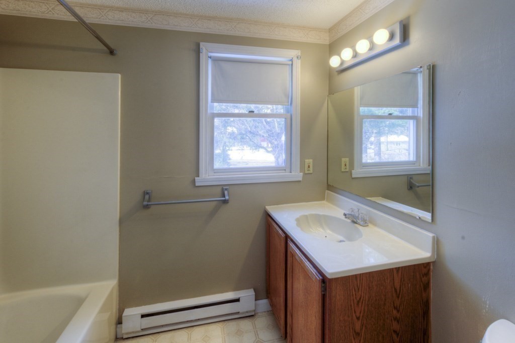 21 Marchioness Road Springfield, MA 01129 - Photo 26 of 38 a bathroom with a sink and a bathtub