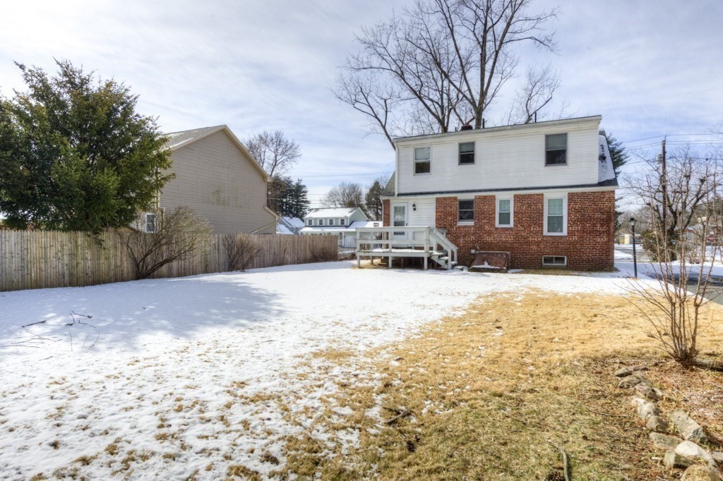 21 Marchioness Road Springfield, MA 01129 - Photo 34 of 38 a front view of a house with a yard covered with snow