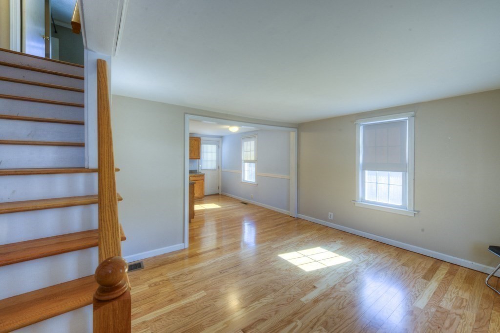 21 Marchioness Road Springfield, MA 01129 - Photo 10 of 38 a view of empty room with wooden floor and fan
