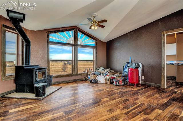 39301 Jacobson Road Rush, CO 80833 - Photo 3 of 40 Wood Burning Fireplace keeps the whole house warm!