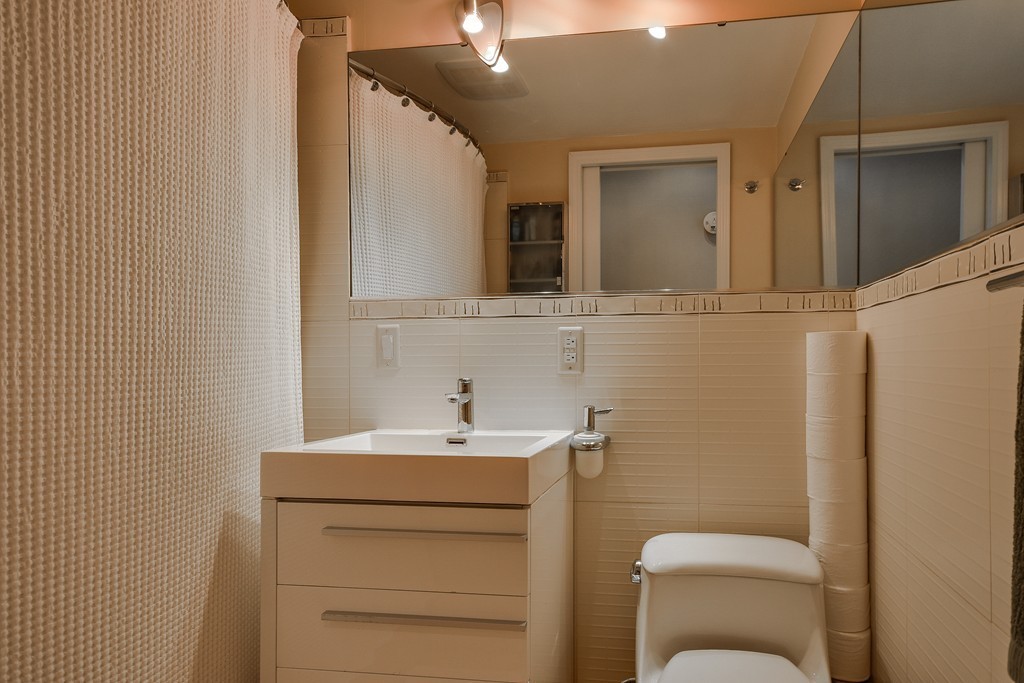 20 Rutledge Road Natick, MA 01760 - Photo 15 of 29 a bathroom with a toilet sink and mirror