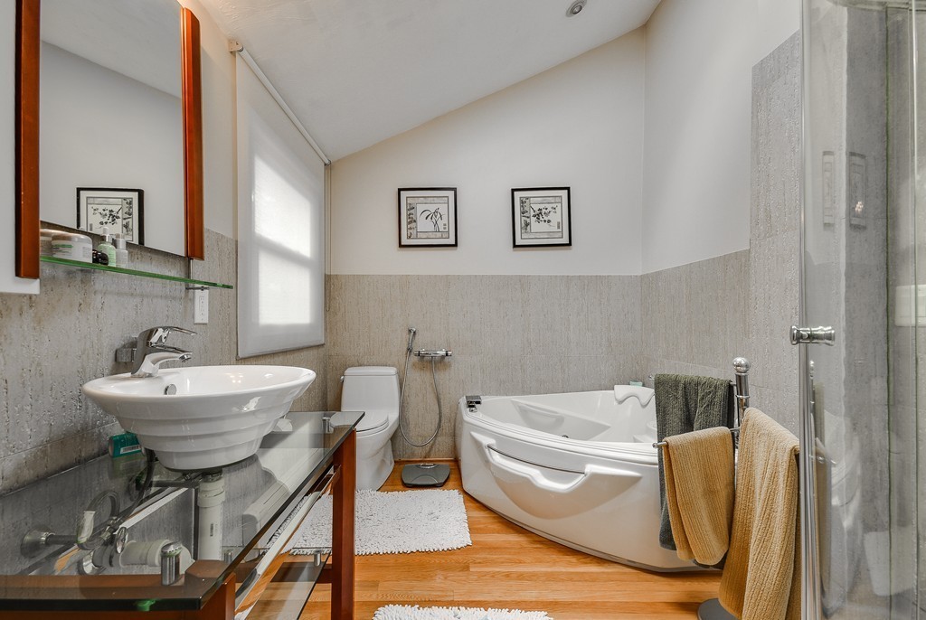 20 Rutledge Road Natick, MA 01760 - Photo 17 of 29 a bathroom with a sink and a mirror